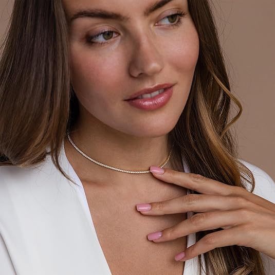 Tenniskette aus Gold