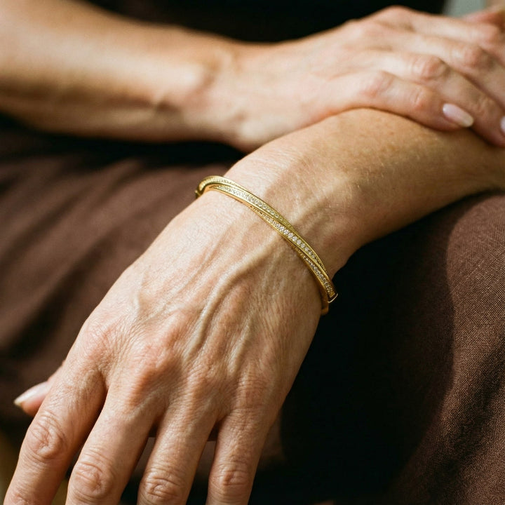 Elegantes Kristallarmband mit zwei Reihen in Gold