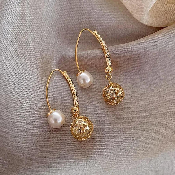 Retro-Hänge-Ohrringe in Gold mit Margeriten