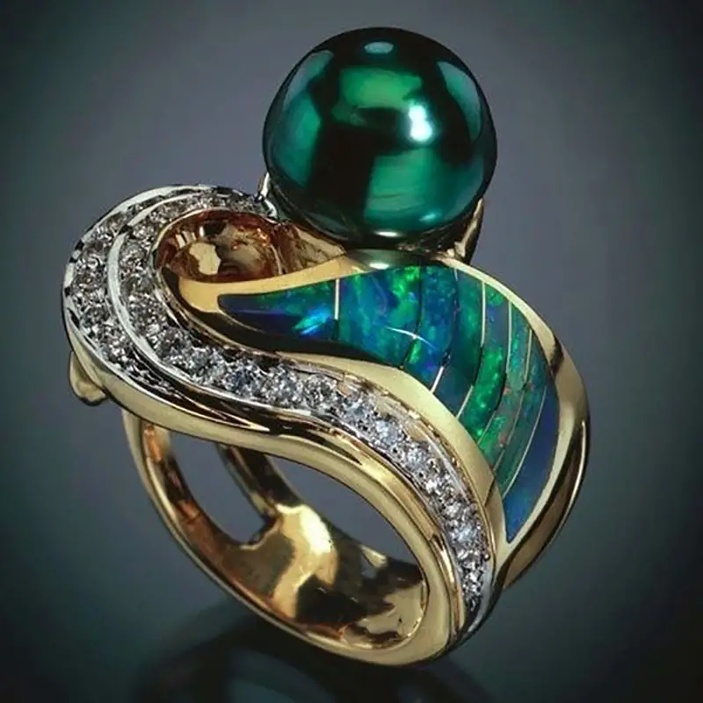 Retro-Ring mit grünen Brillanten
