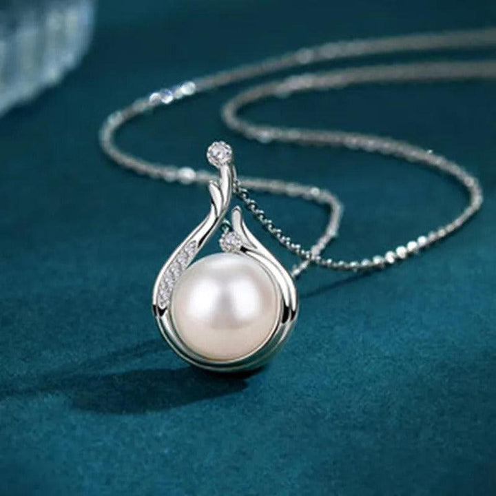 Retro-Weissgoldkette mit Perlen in Tropfenform