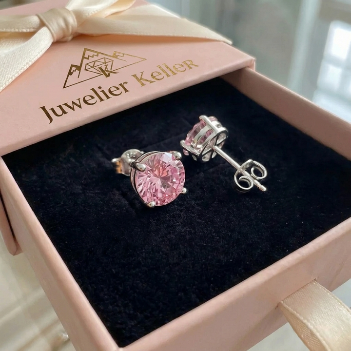 Runde Ohrringe aus rosa Saphir